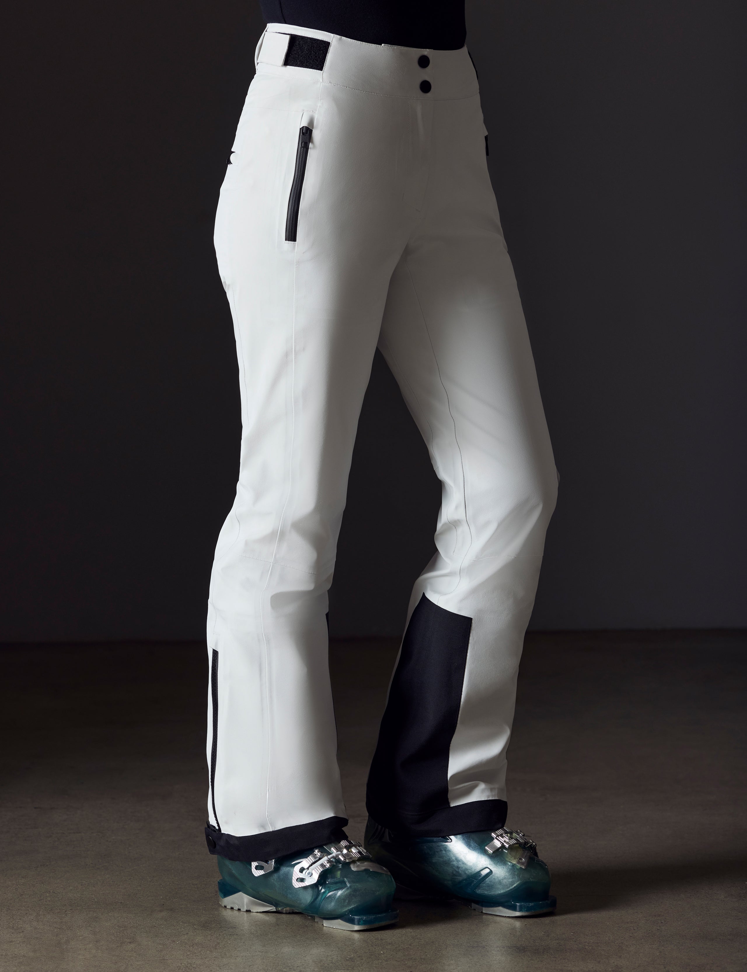 woman wearing white snow pant from AETHER Apparel