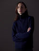 Woman wearing dark blue Davis Half-Zip Sweater