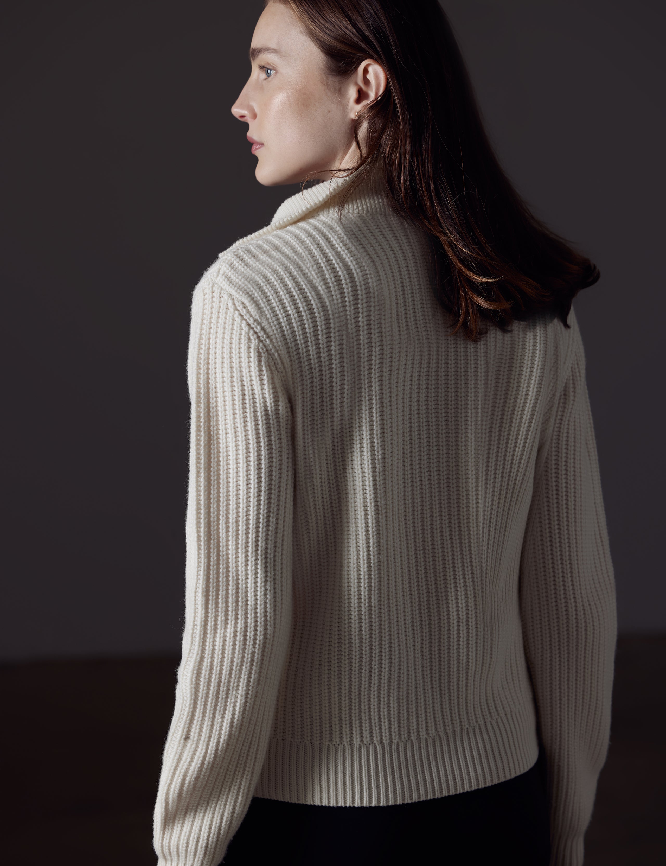Back view of woman wearing white Davis Half-Zip Sweater
