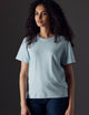 Woman wearing blue organic tee from AETHER Apparel