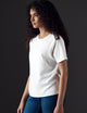 Woman wearing white organic tee from AETHER Apparel