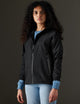 Woman wearing black jacket from AETHER Apparel