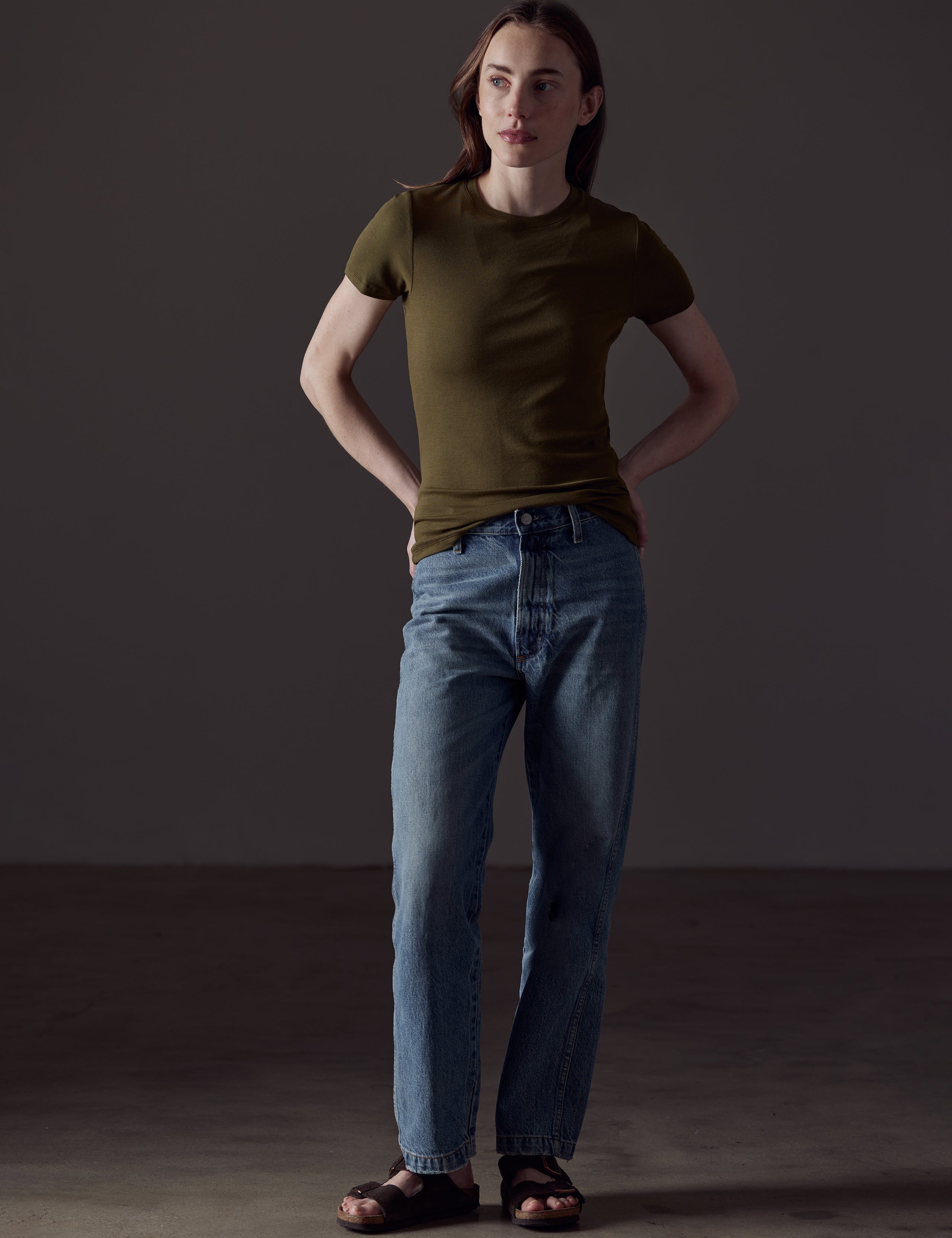 woman wearing green short-sleeve shirt from AETHER Apparel