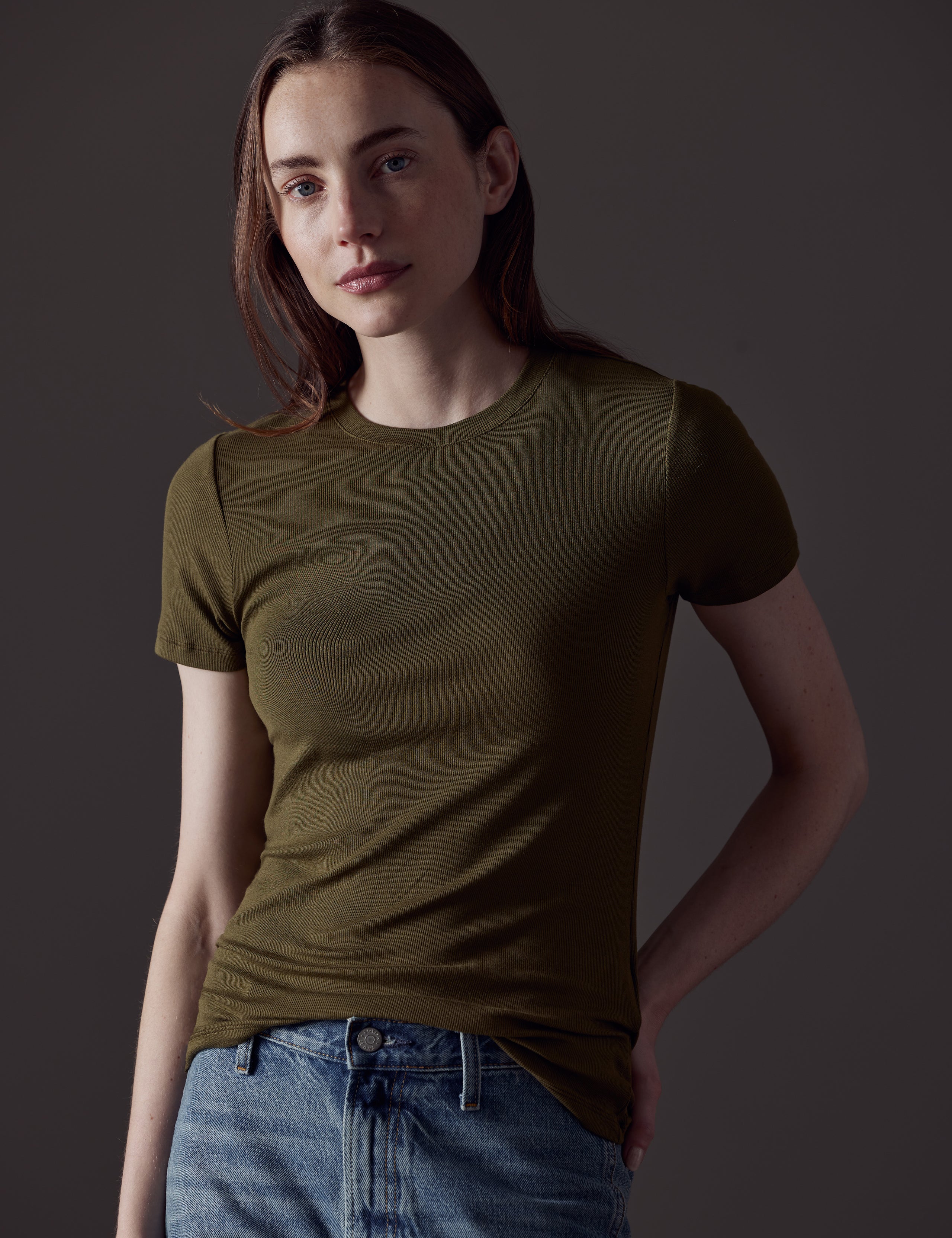 woman wearing green short-sleeve shirt from AETHER Apparel