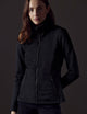 Woman wearing black full-zip from AETHER Apparel
