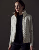 woman wearing white insulated jacket from AETHER Apparel