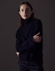 Woman wearing black Leigh Cashmere Turtleneck Sweater