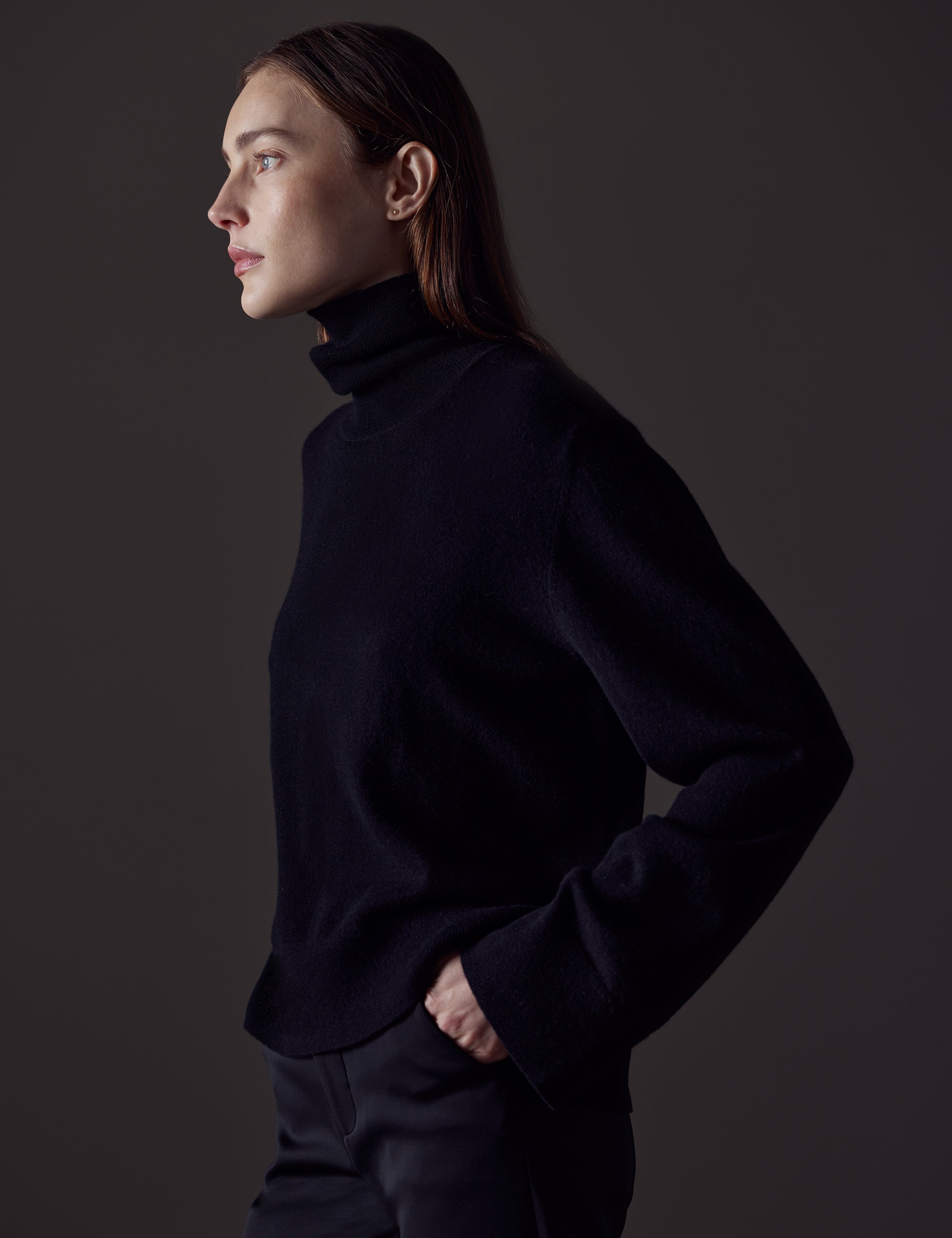 Woman wearing black Leigh Cashmere Turtleneck Sweater