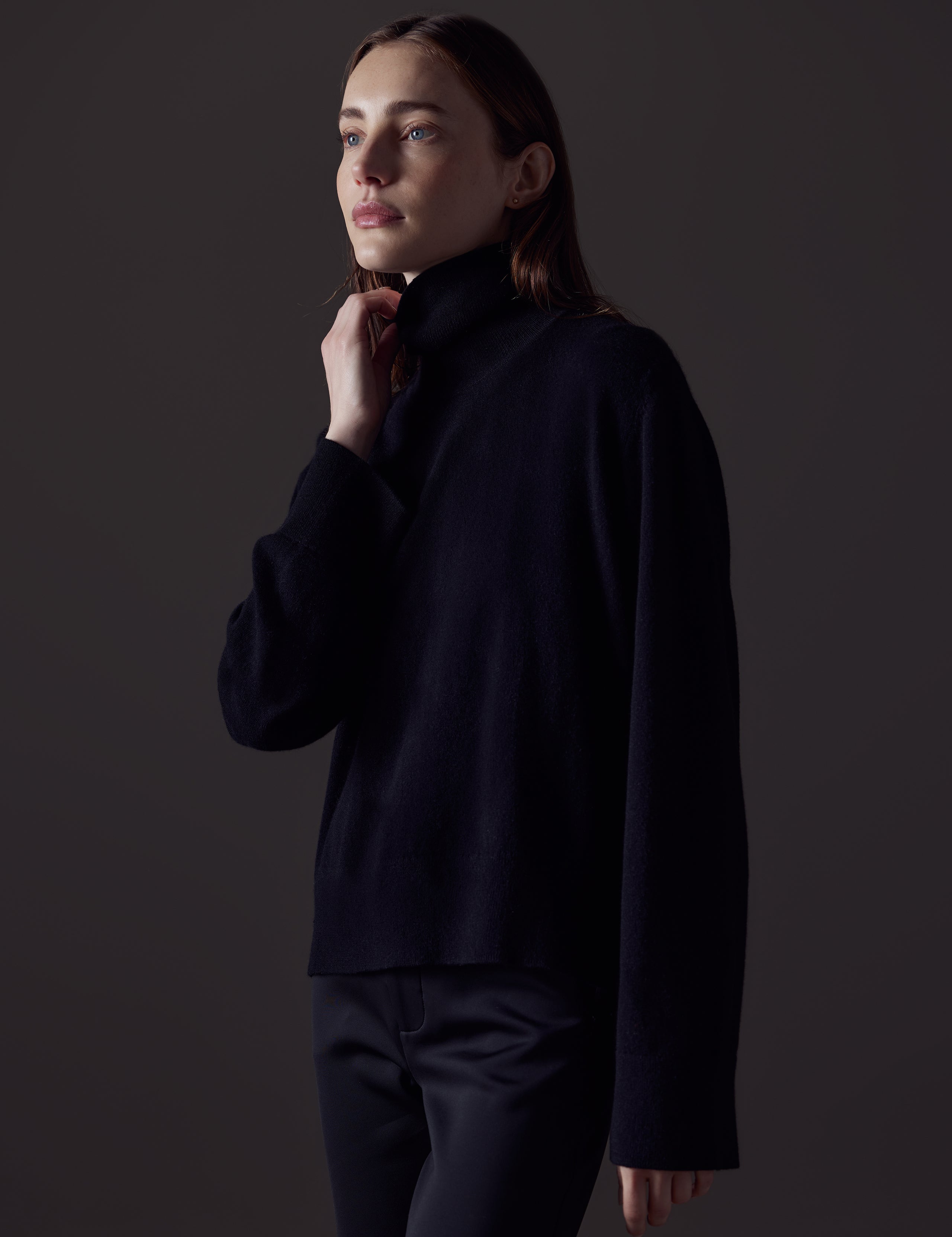 Woman wearing black Leigh Cashmere Turtleneck Sweater