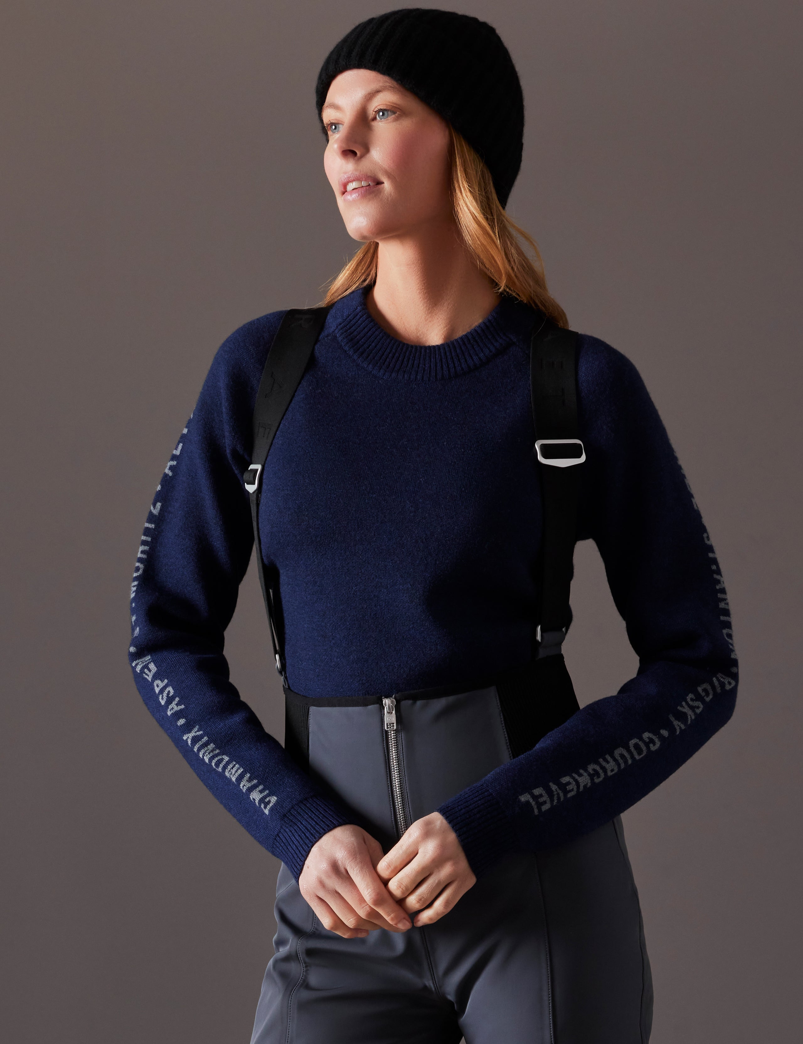 woman wearing dark blue sweater from AETHER Apparel