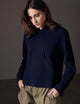 woman wearing blue sweater from AETHER Apparel