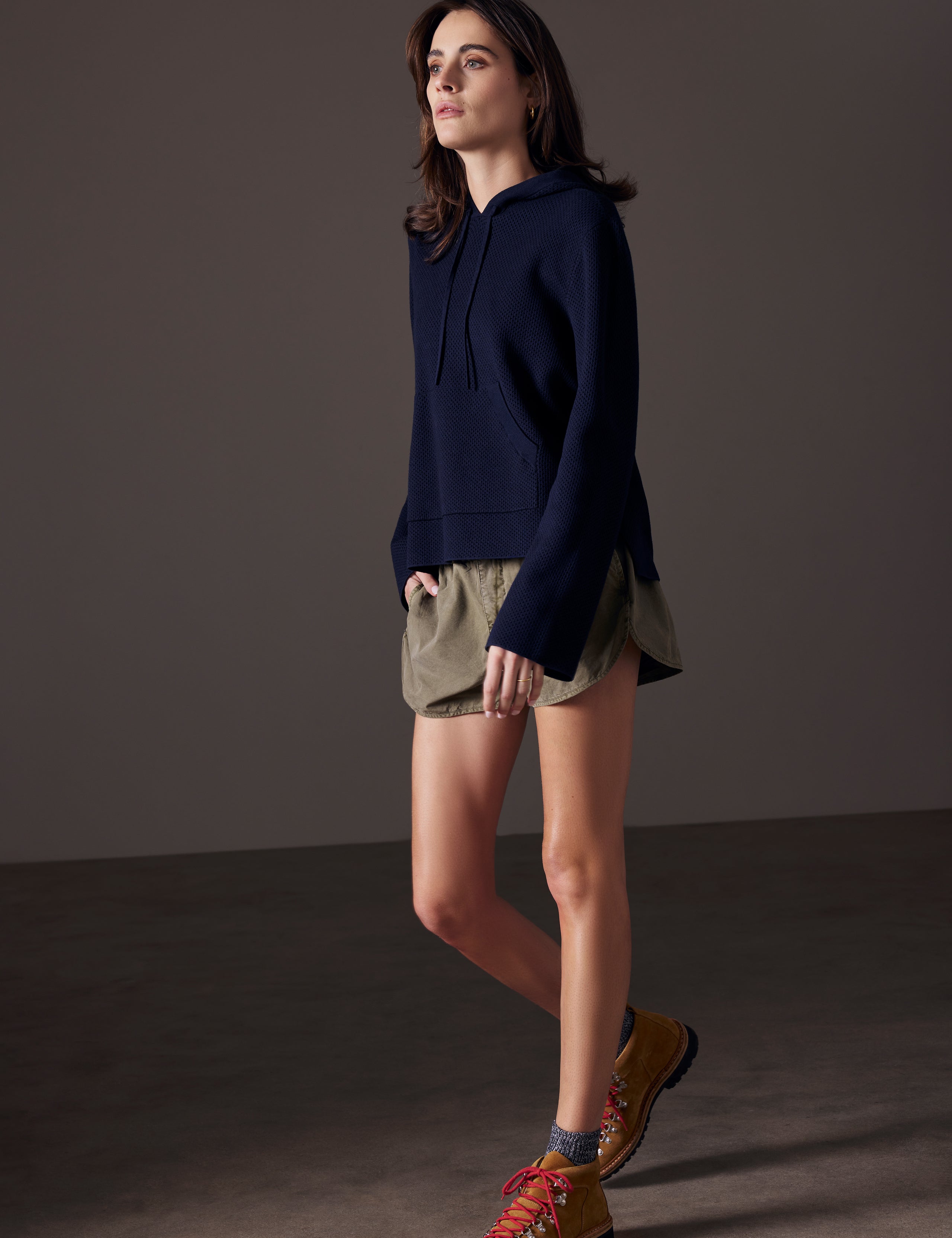 woman wearing blue sweater from AETHER Apparel