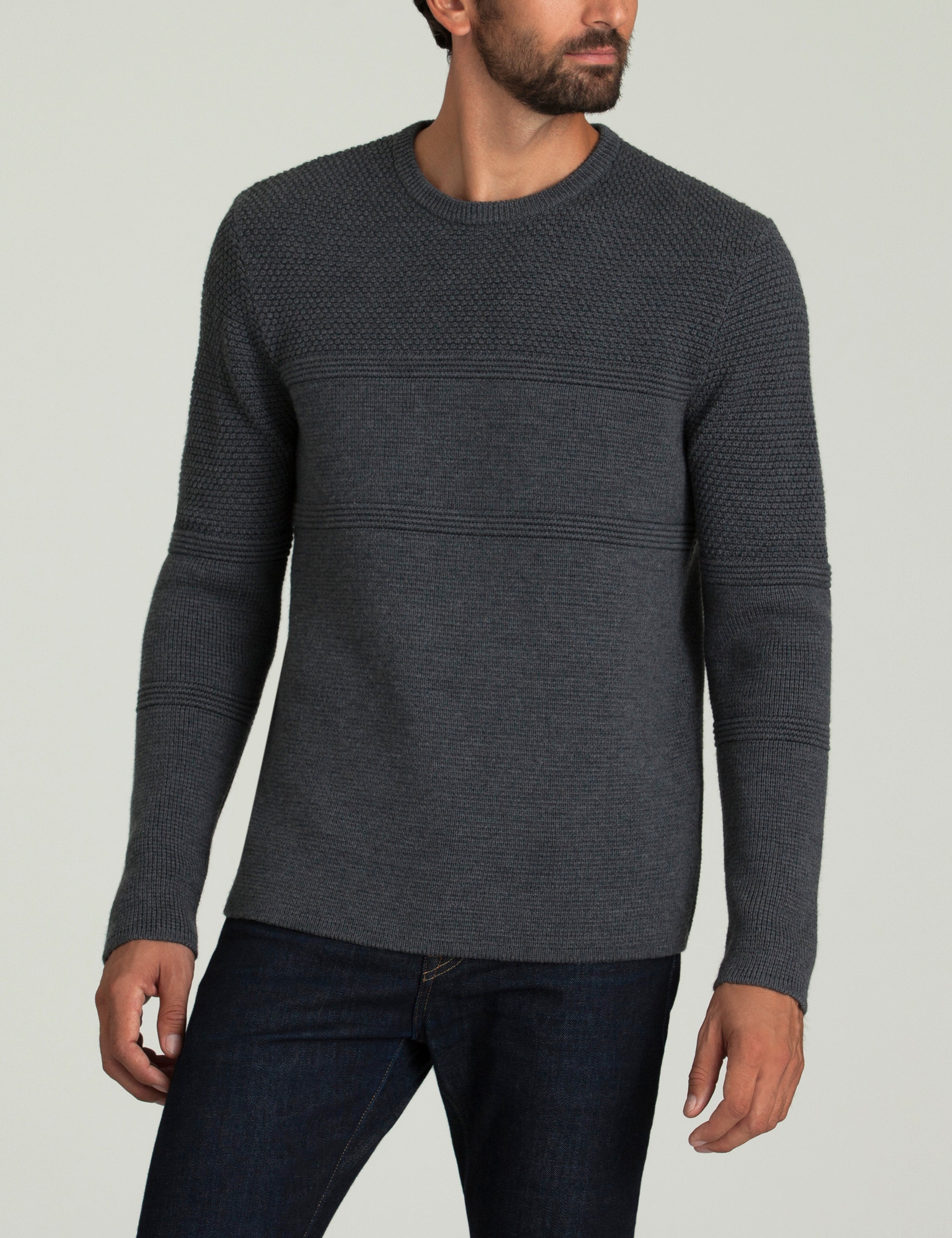 man wearing dark grey sweater