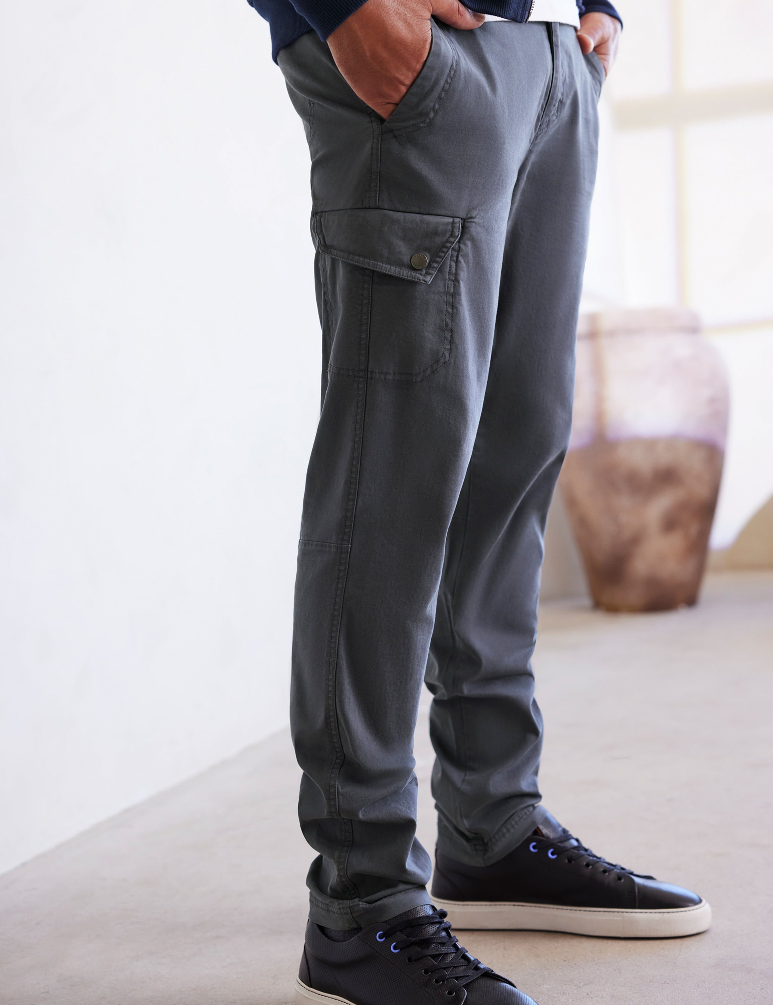 man wearing grey pants from AETHER Apparel