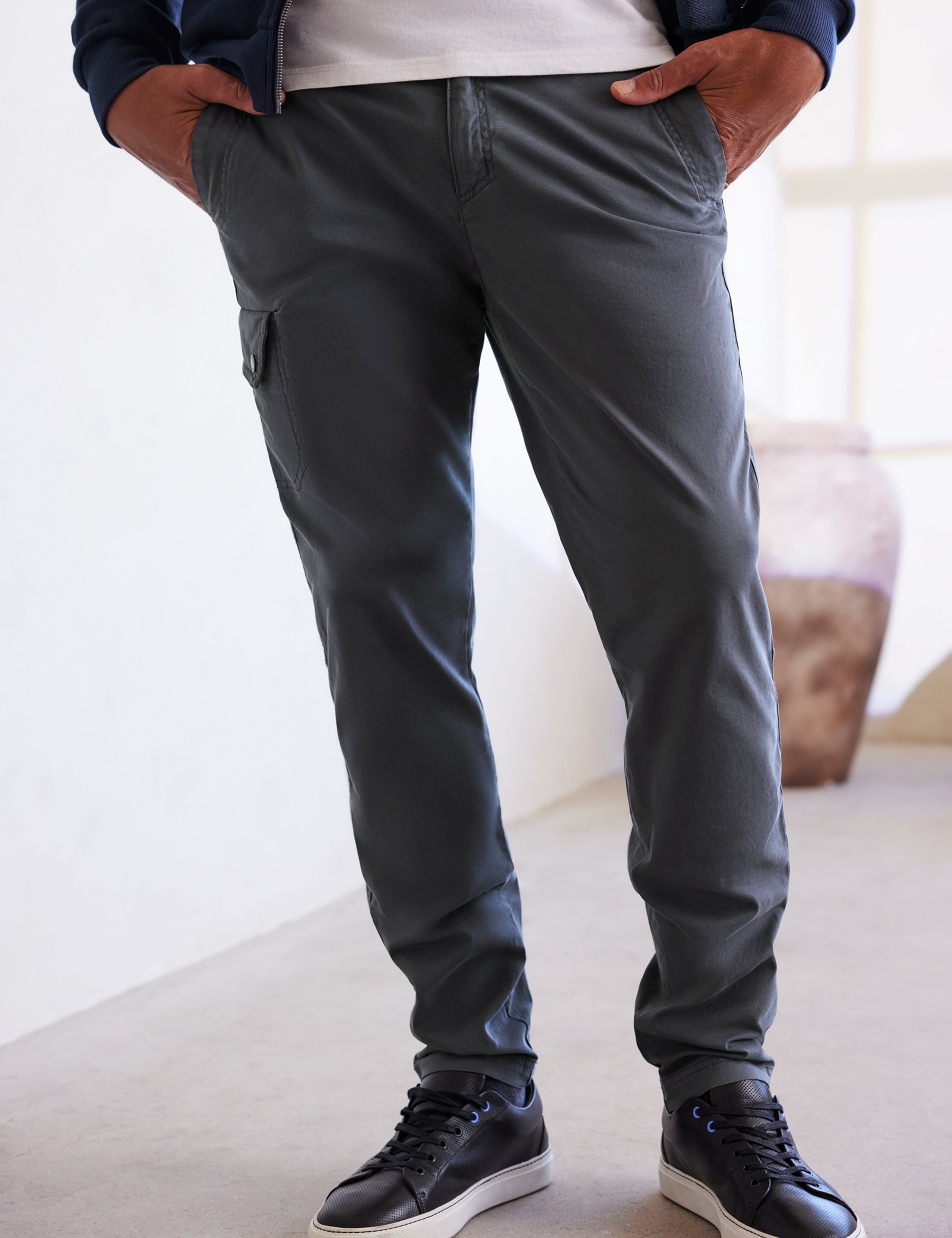 man wearing grey pants from AETHER Apparel