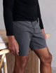 man wearing grey shorts from AETHER Apparel.