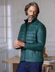 man wearing green ski jacket