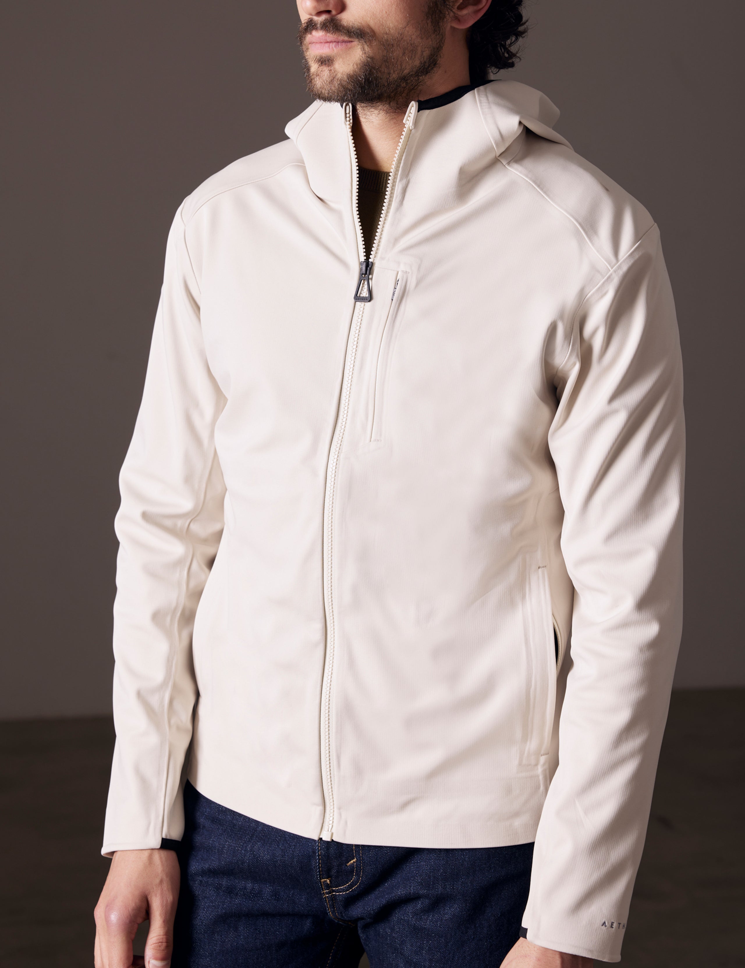 man wearing beige fleece full-zip jacket from AETHER Apparel