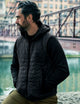 man wearing insulated black hoodie