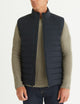 man wearing black insulated vest