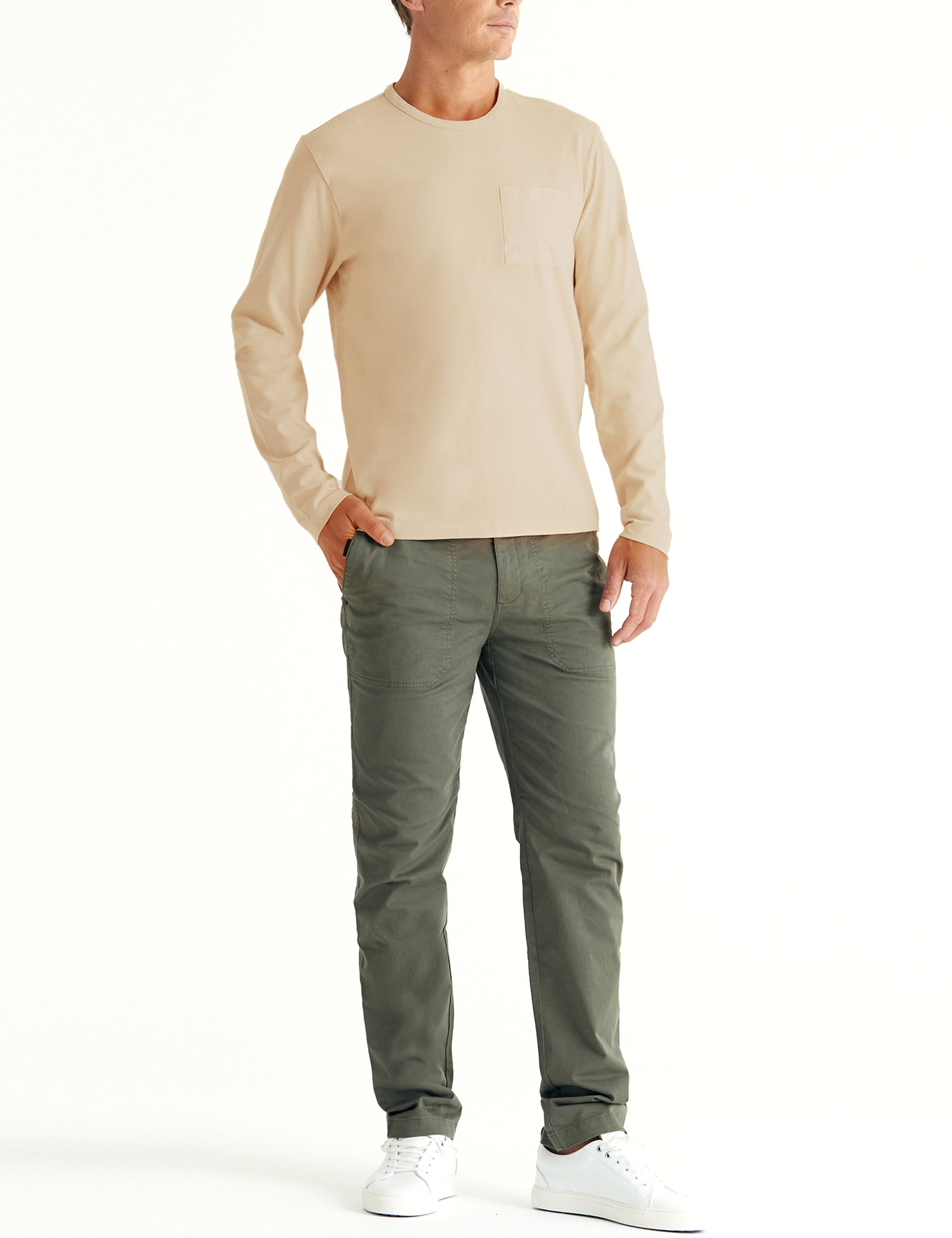 man wearing beige long sleeve shirt