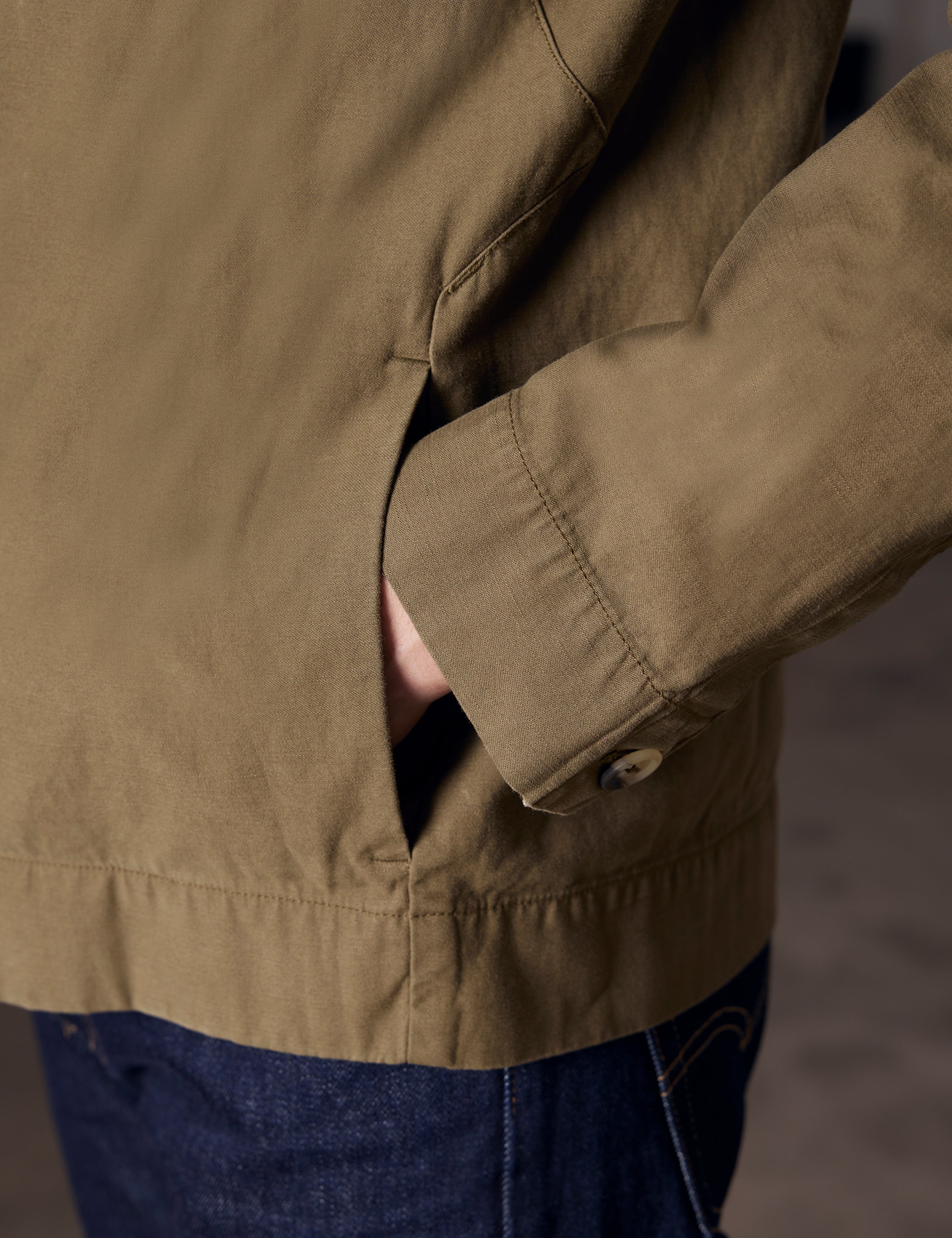 Pocket close-up of green shirt jacket from AETHER Apparel