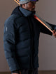 man wearing blue ski jacket from AETHER Apparel