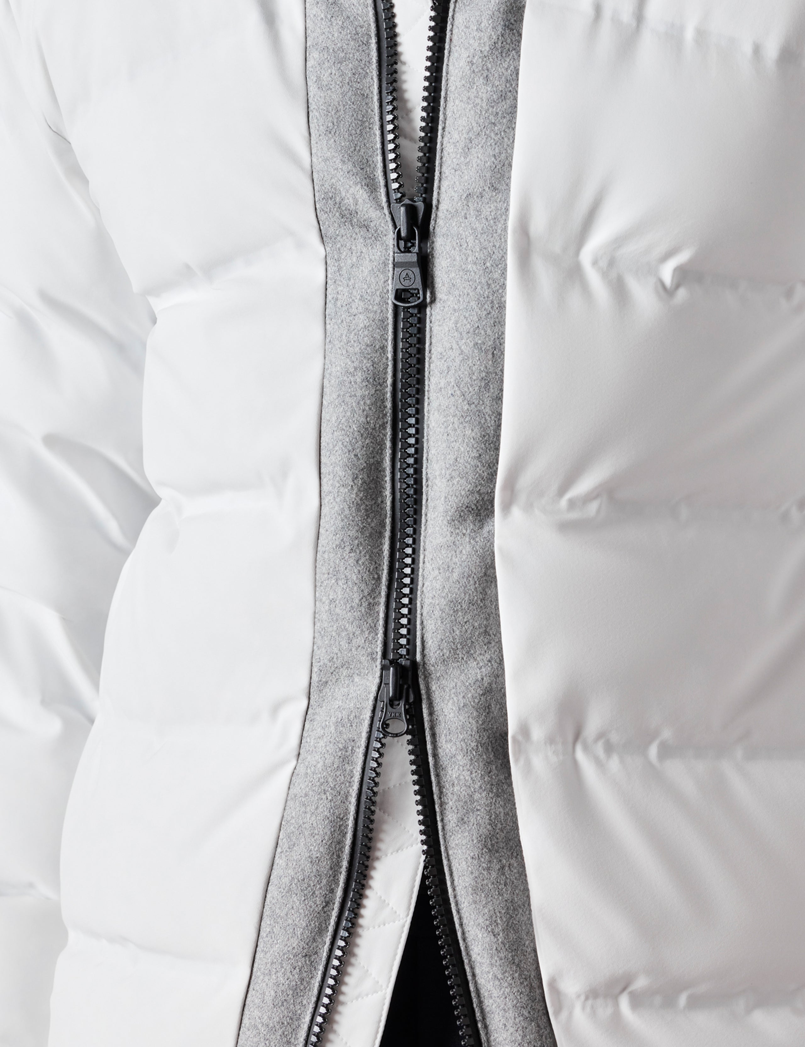 close up of white men's ski jacket from AETHER Apparel