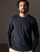 man wearing blue long-sleeve tee from AETHER Apparel