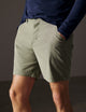 man wearing green swim short