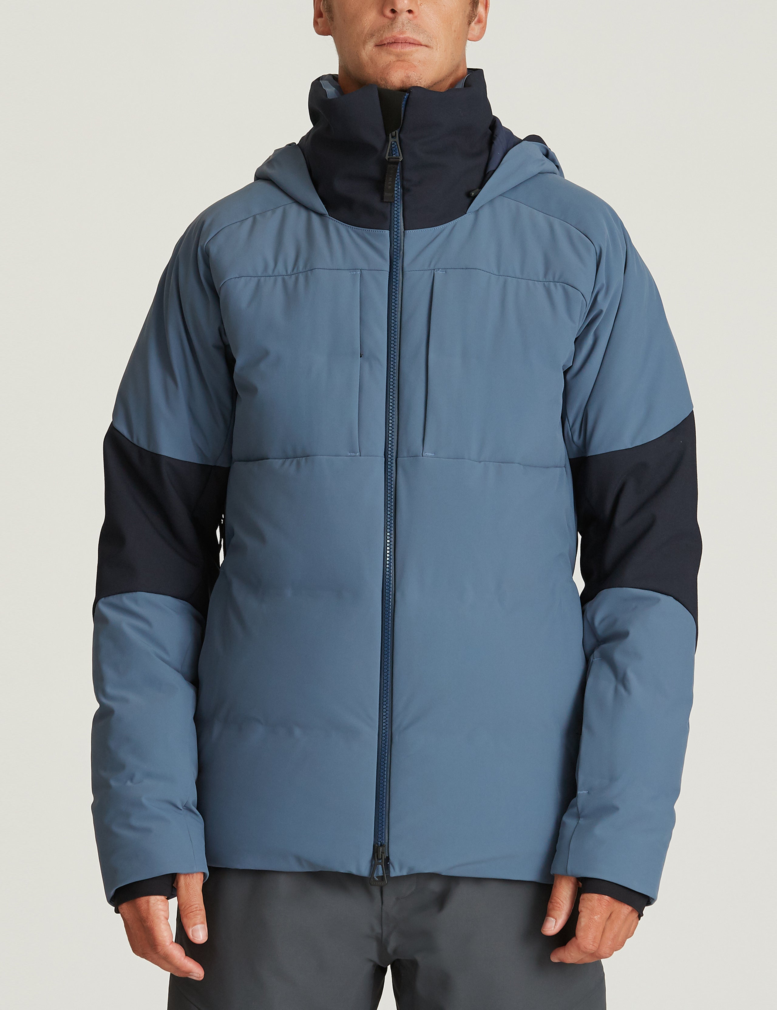man wearing blue ski jacket from Aether Apparel