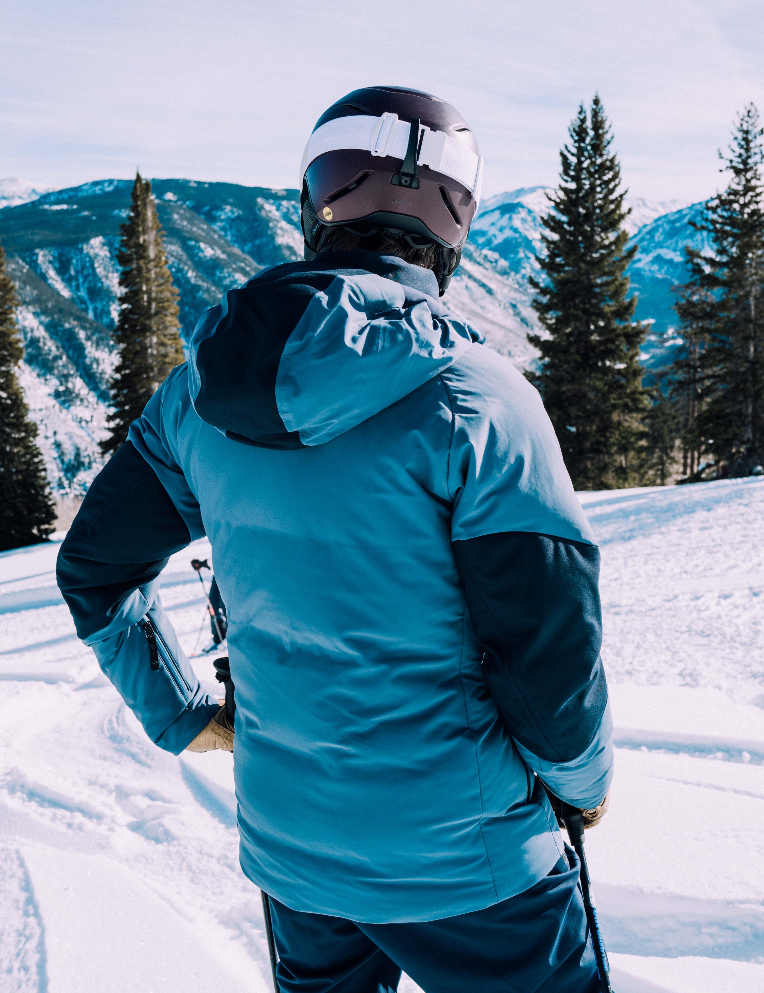 man wearing blue ski jacket from Aether Apparel