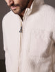 man wearing beige fleece full-zip