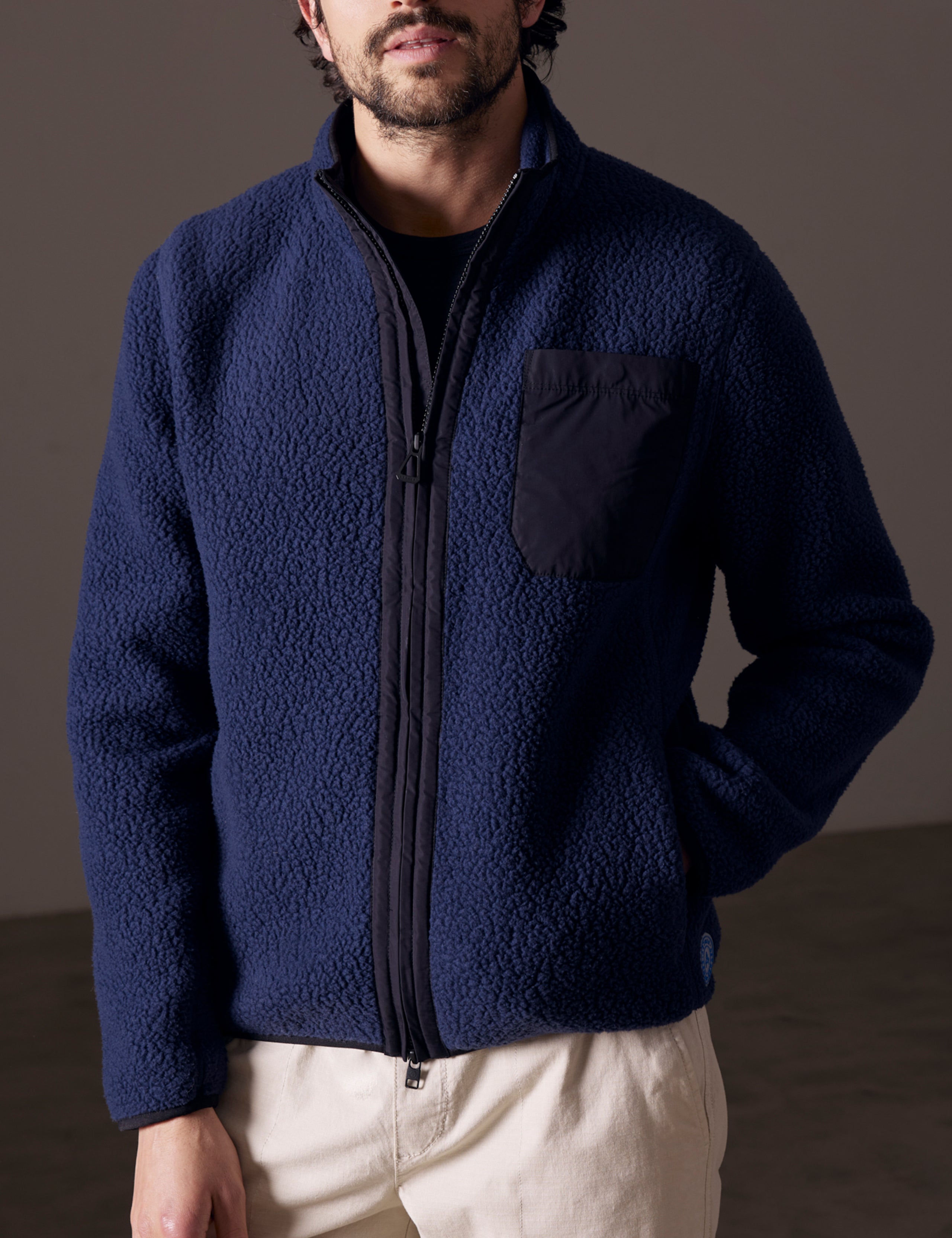 man wearing blue fleece full-zip