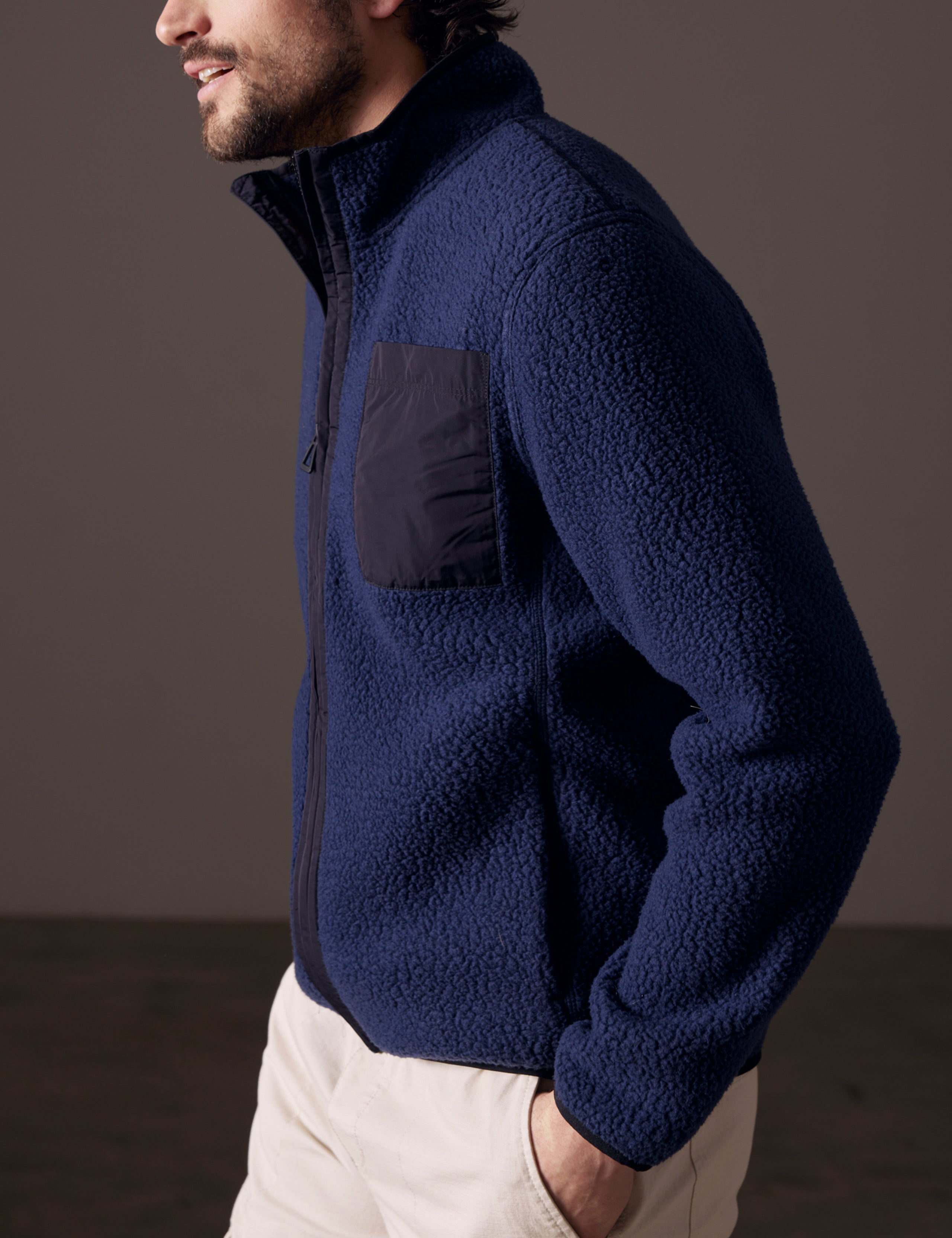 man wearing blue fleece full-zip