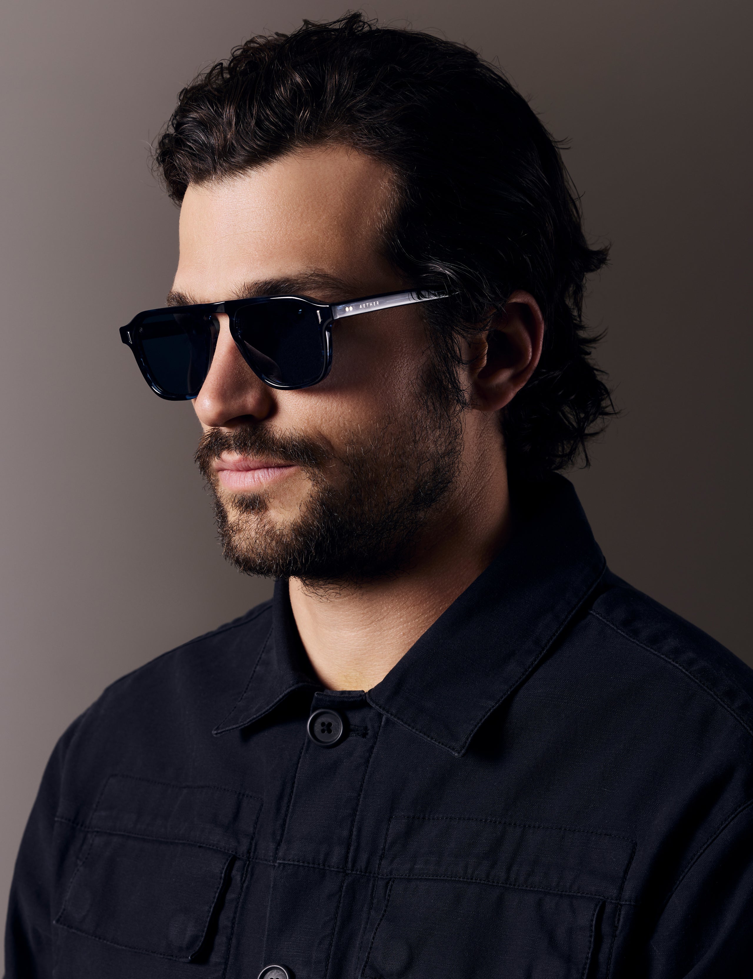 Man wearing Sequoia in Blue Tortoise