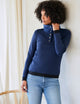 Woman wearing blue Align Pullover from AETHER Apparel