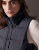 woman wearing black insulated vest from AETHER Apparel