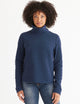 woman wearing blue high neck pullover