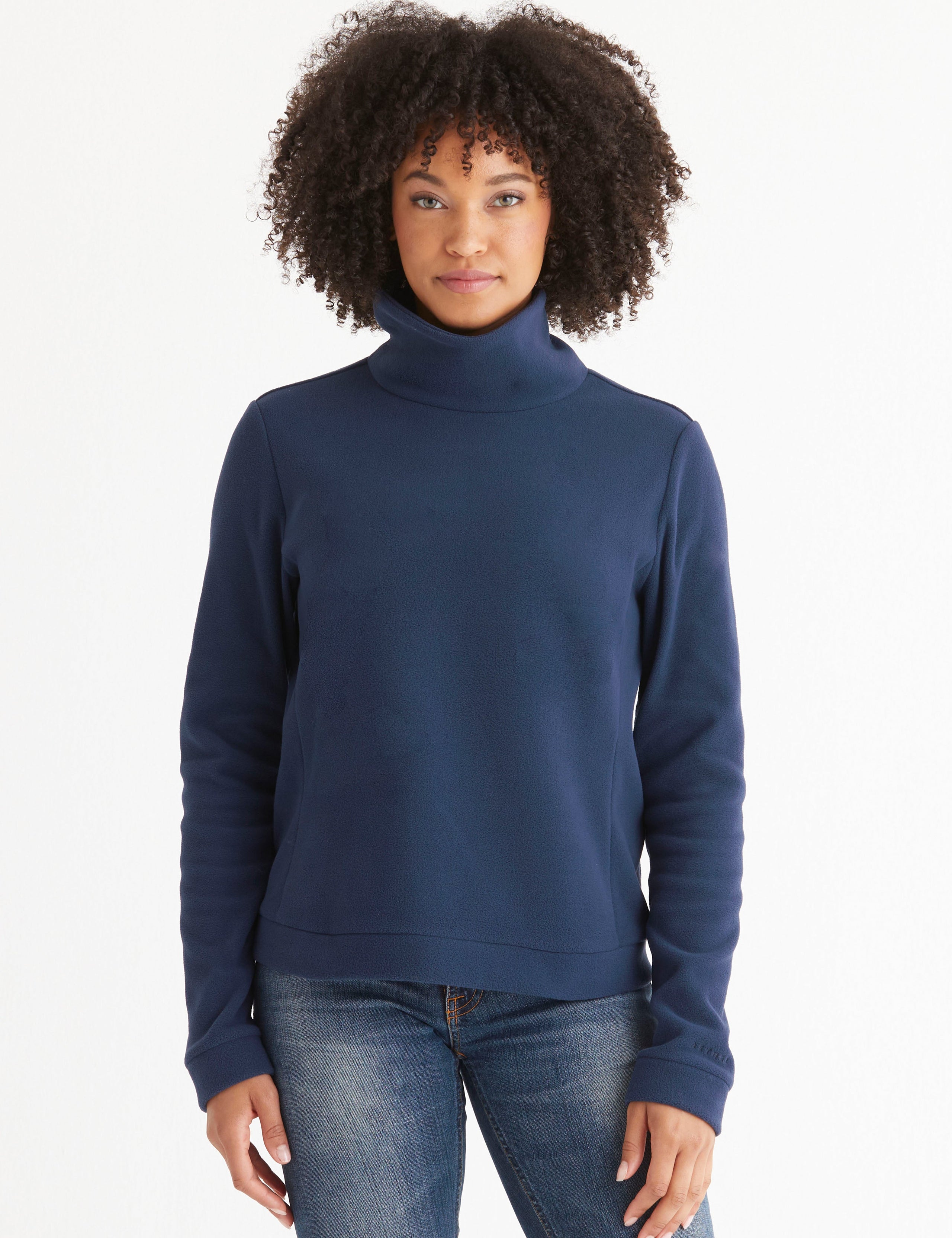 woman wearing blue high neck pullover