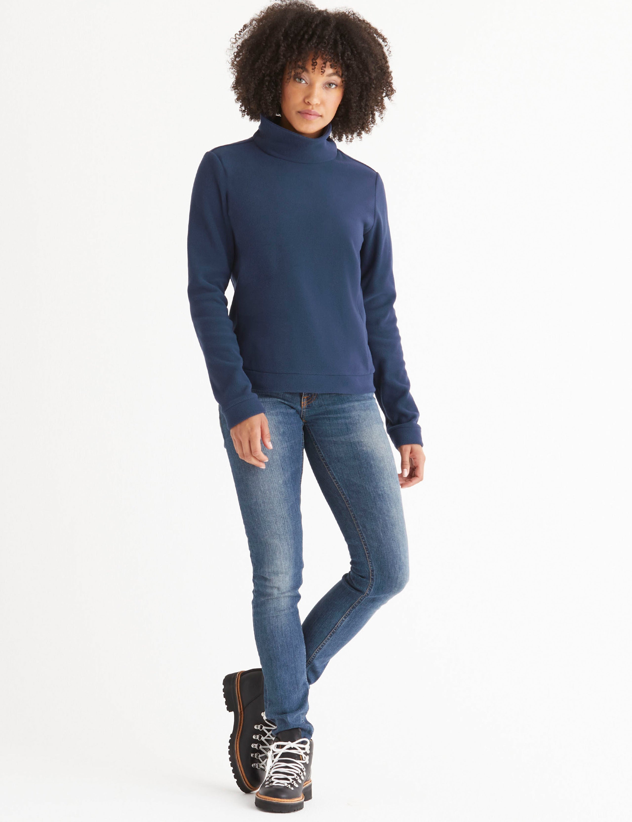 woman wearing blue high neck pullover