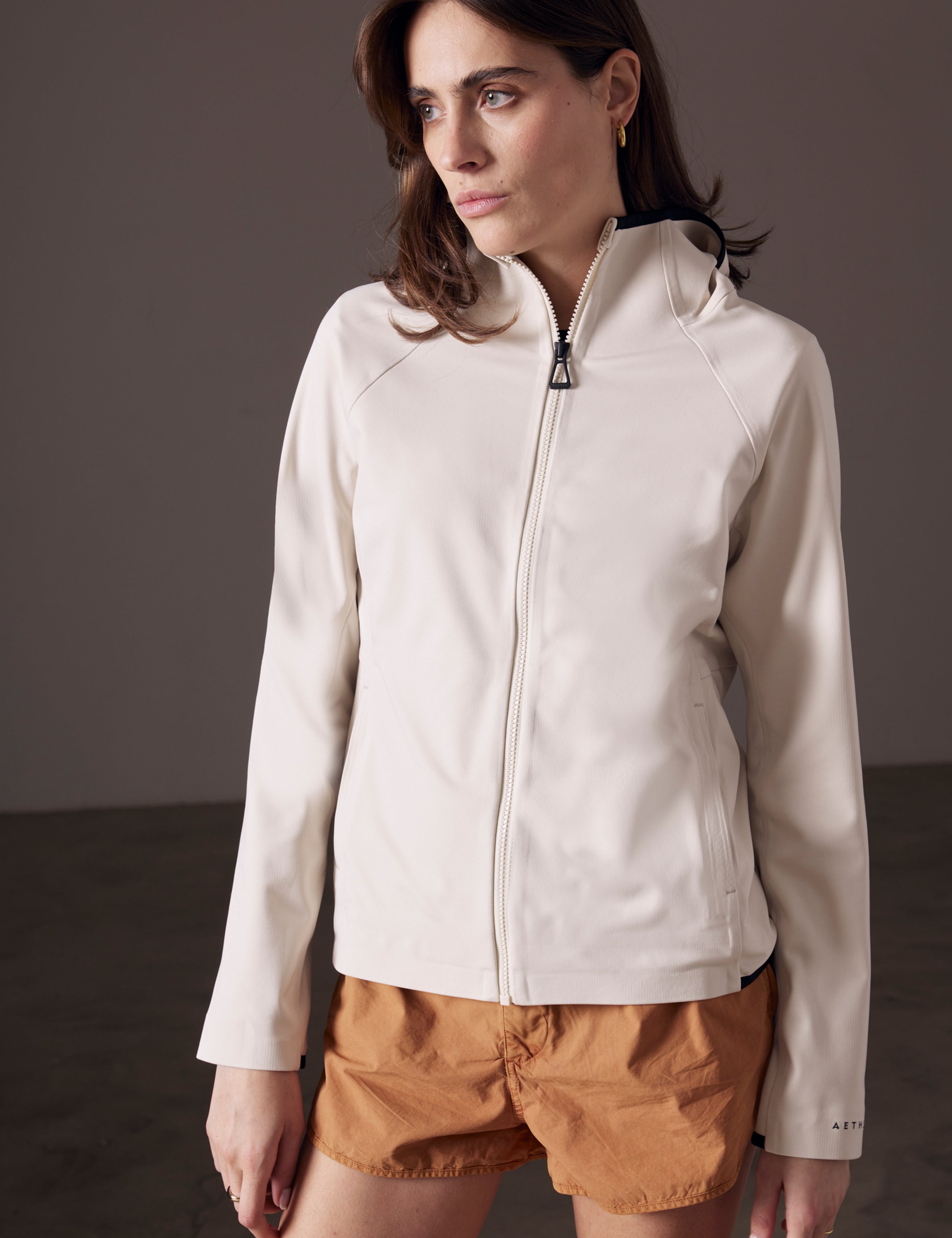 woman wearing beige fleece jacket