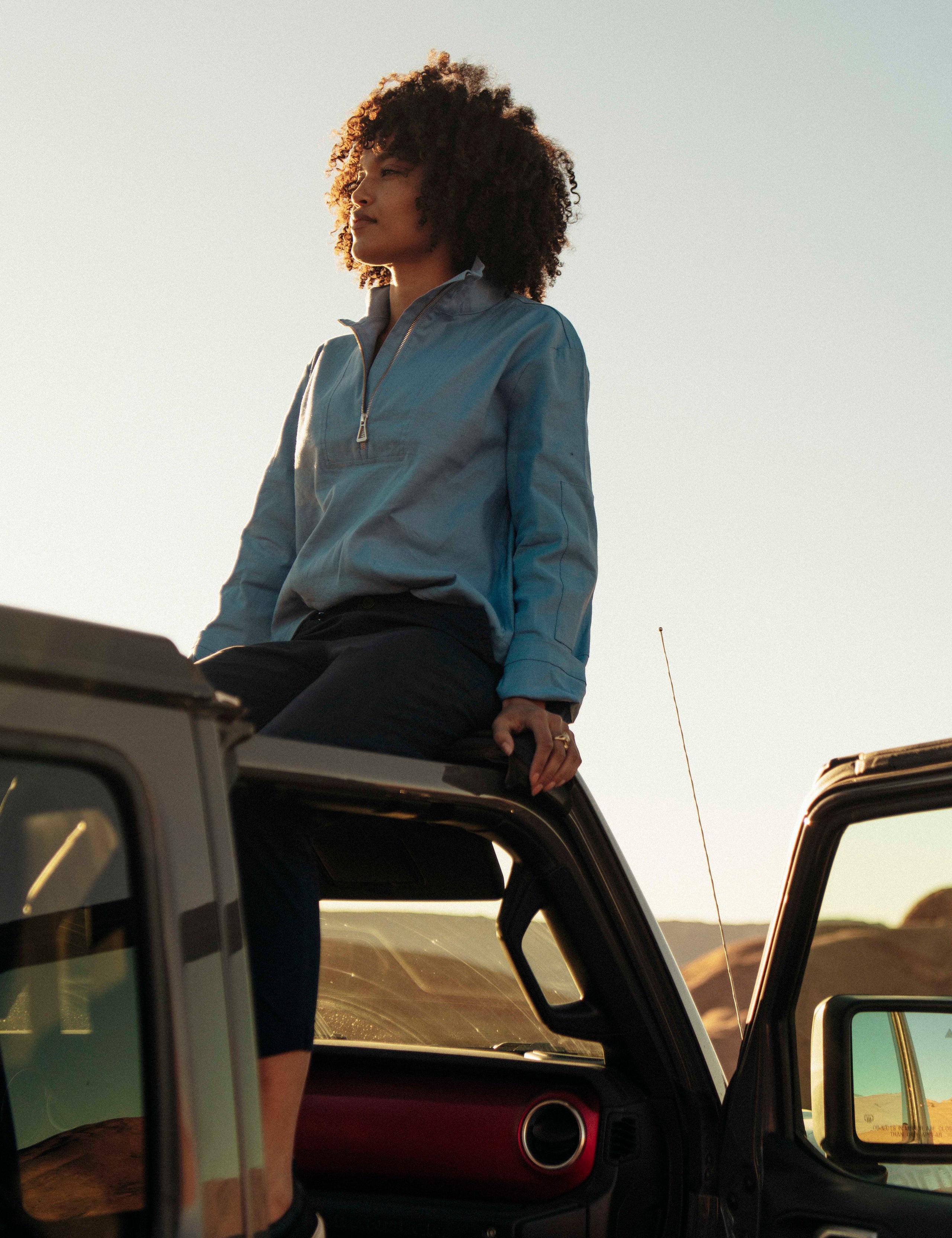 woman wearing blue anorak