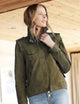 woman wearing green jacket from AETHER Apparel