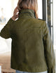 woman wearing green jacket from AETHER Apparel