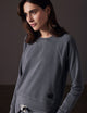 woman wearing grey pullover from AETHER Apparel