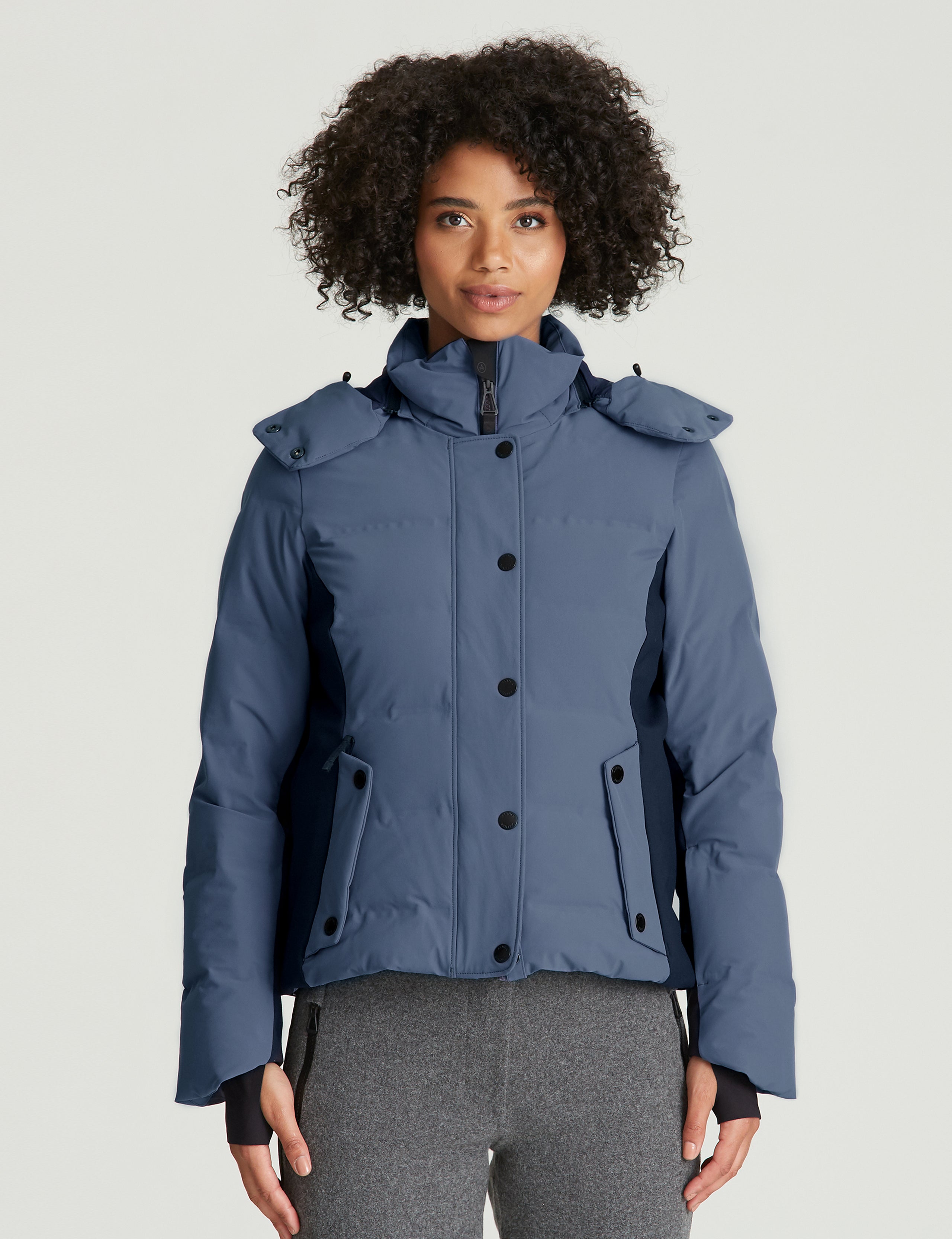 woman wearing blue ski jacket from Aether Apparel