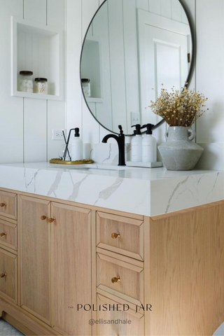 The Polished Jar bottle dispensers on bathroom countertop