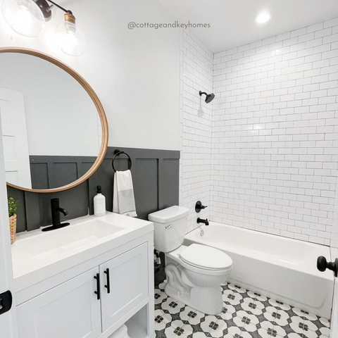 Black and White Bathroom With The Polished Jar Bottle Dispenser on White Counter