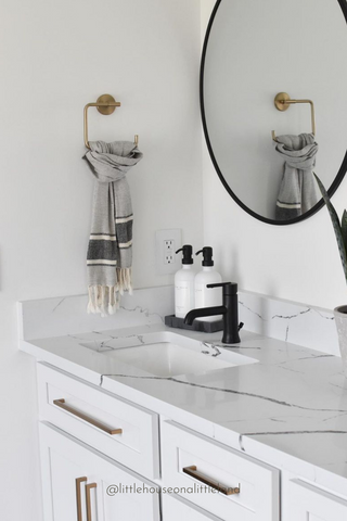 Marble Bathroom Countertop Decluttered and Organized With The Polished Jar Glass Bottle Soap Dispenser